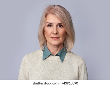 Old Woman Portrait Isolated On Grey Background