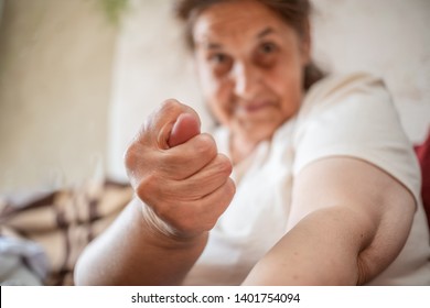 Old Woman Shows Hand Gestures Fig