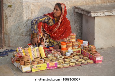 An Old Woman Sitting On Indian Street Market And Selling Colorful Bangles. Lady Selling Bangles On The Streets Of Udaipur City. : Udaipur India - June 2020.