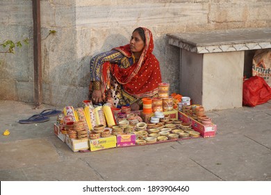 An Old Woman Sitting On Indian Street Market And Selling Colorful Bangles. Lady Selling Bangles On The Streets Of Udaipur City. : Udaipur India - June 2020. NHY