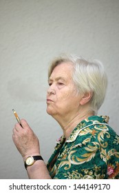 Old Woman Smoking Portrait