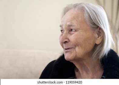 old woman speaks with somebody