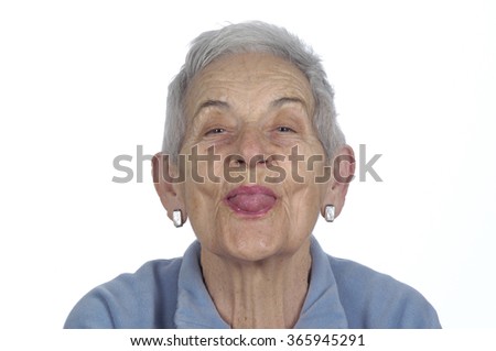 old woman sticking out her tongue