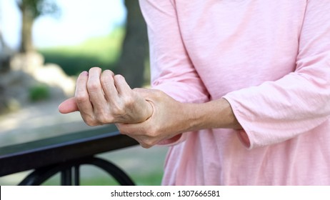 Old Woman Stretching Numb Arm, Weakness Of Muscles In Senior Age, Arthritis