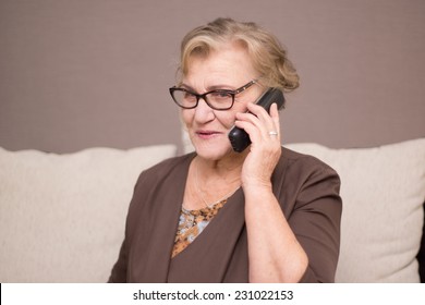 Old Woman Talking On The Phone    