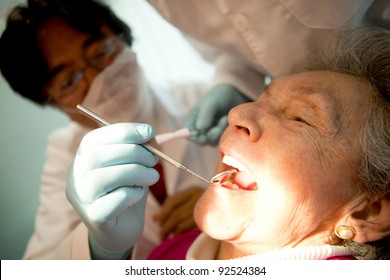 Old Woman Visiting The Dentist Taking Care Of Her Teeth