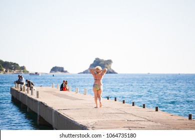 Old Woman Walk On Beach