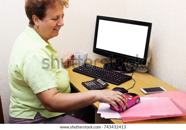 an old woman working at a computer and dreaming about\
a car. Earnings through the Internet. High salary. Grandmother\
wants to buy a car. Accounting, profit growth graphs,\
entrepreneurship. mock up