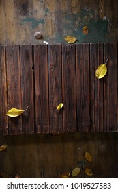 Old Wood And Autumn Leaves