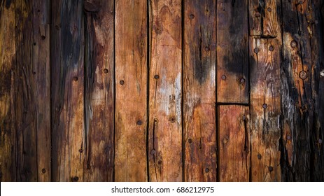 old wood boards on the deck and the hull of the ship