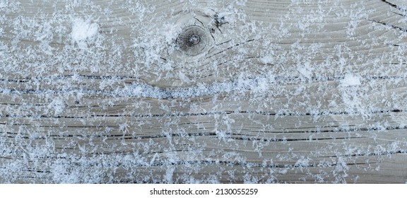 Old Wood Grain Snow Covered Background. Snow Flakes And Winter Background