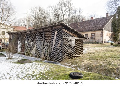 Old Wood Shed Repaired With Other Boards.