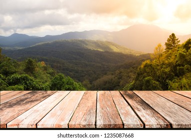 Old Wood Table Top On Mountain And Sunset  Background Image, For Product Display Montage
