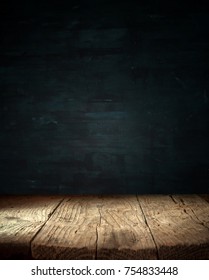 Old Wood Table Top With Smoke In The Dark Background.