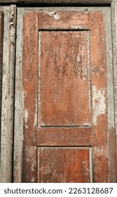 old wooden antique door with ruined paint. High quality photo - Shutterstock ID 2263128687