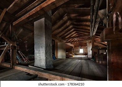 Old Wooden Attic With Roof Framework Structure And Window