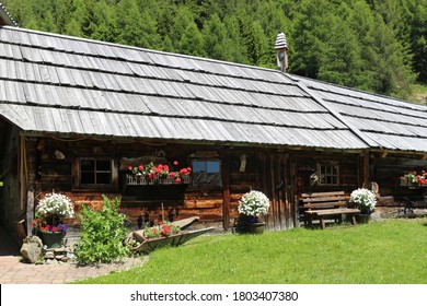 Old wooden barn with shingle roof in the mountains. On Sommeregger Alm,  height 1720 m, above the Millstatt lake.
