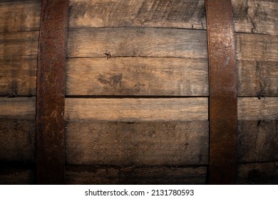 Old Wooden Barrel Texture Background. Wine Or Beer Cask Close Up. Weathered, Aged, Rusty, Vintage Container In Brewery Cellar. Copy Space For Design