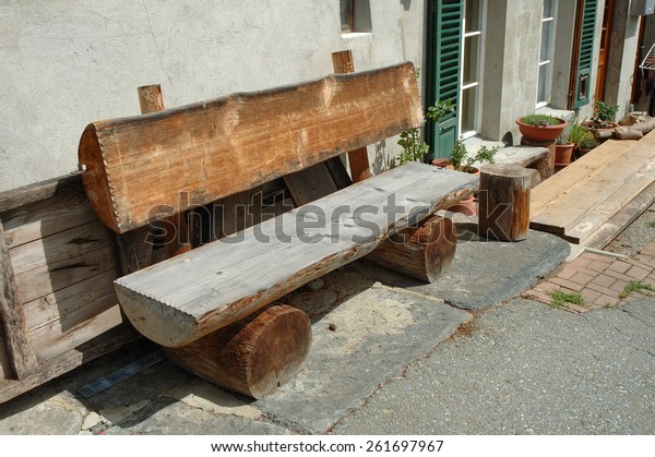 Old Wooden Bench Made Tree Trunk Stock Photo Edit Now 261697967