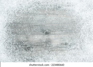 Old Wooden Board With Snow Flakes. Christmas Background