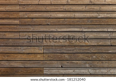 Old wooden boards background of brown color.