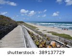 Old wooden boardwalk provides handicapped access to the beach at John D MacArthur State Park, near West Palm Beach, Florida