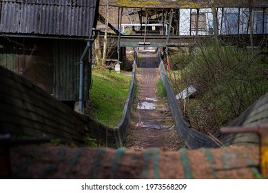 Old Wooden Bobsleigh Track Start Descent. Old Wooden Sledge Track In The Forest. Sport