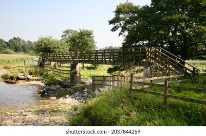 An Old Wooden Bridge In The Lancashire Countryside