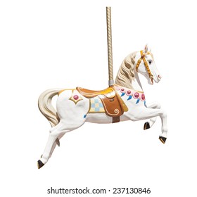 Old wooden carousel horse isolated on white background