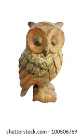 Old wooden carved Owl on white background