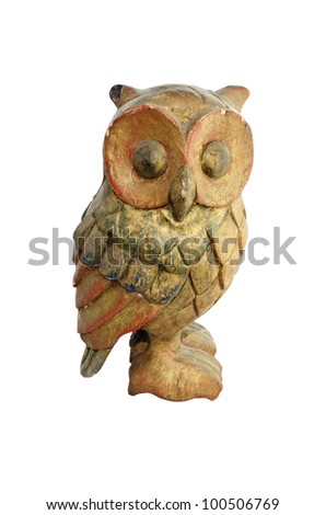 Old wooden carved Owl on white background