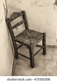 Old Wooden Chair In Abandoned Room