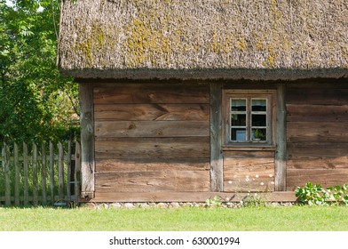 Old Wooden Cottage In Open Air Museum