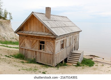 Old wooden country house on the shore - Shutterstock ID 2167514301