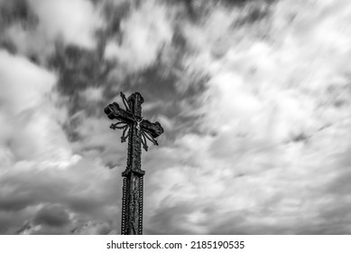 Old Wooden Cross Among The Clouds