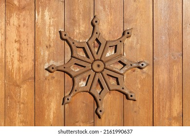 Old wooden decoration element on an old gate. Tatar ornaments. Kazan, Russia