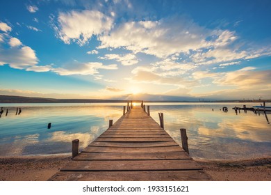 Old wooden dock at the lake, sunset shot