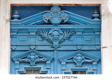 Old wooden door covered with cracks, worn paint. An ideal base for creative design fashion trend in modern development - Powered by Shutterstock