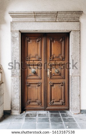 Old wooden door. Old double wooden door in the building