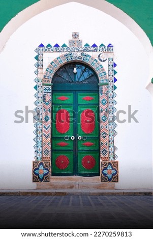 old wooden door in tlemcen algeria with arabic and islamic style art , tlemcen algeria north africa	
