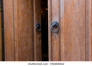 Old wooden doors with rings. Vintage style