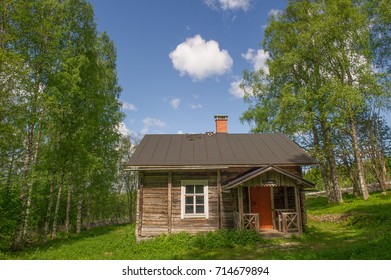 Old Wooden Farm House In A Rural Setting In Finland