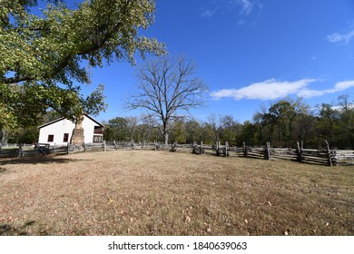 An old wooden fence and a replica of a tavern at the Pea Ridge National Battlefield in Garfield, Arkansas. Area was used in a pivotal Civil War battle.