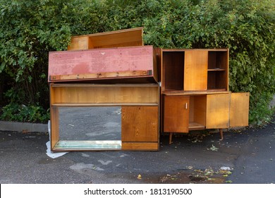 Old Wooden Furniture In The Trash Heap.