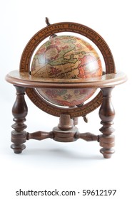 Old wooden globe on wooden stand showing north america on white isolated background.