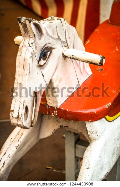 old wooden horse at a\
historic carousel