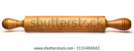 old wooden kneading stick isolated on white background