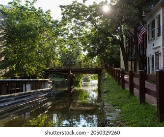 Old Wooden Lock Gates On The Canal In Georgetown By Washington DC With Old Homes Lining The Street