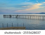 Old wooden pier at Mon Repos Royal Baths on Corfu, Greece