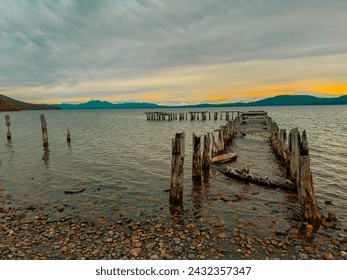 Old wooden pier on the lake on a beautiful sunset in the mountains - Powered by Shutterstock